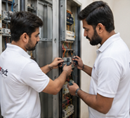 Net Connect engineers checking lift control equipment