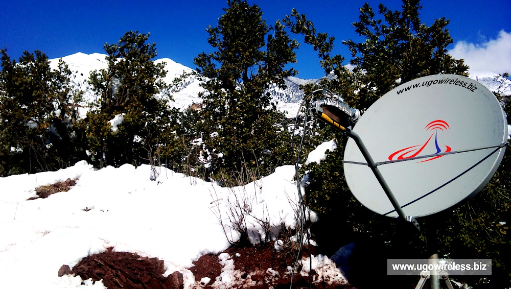 Net Connect satellite dish installed on a snow-covered mountain in Pakistan